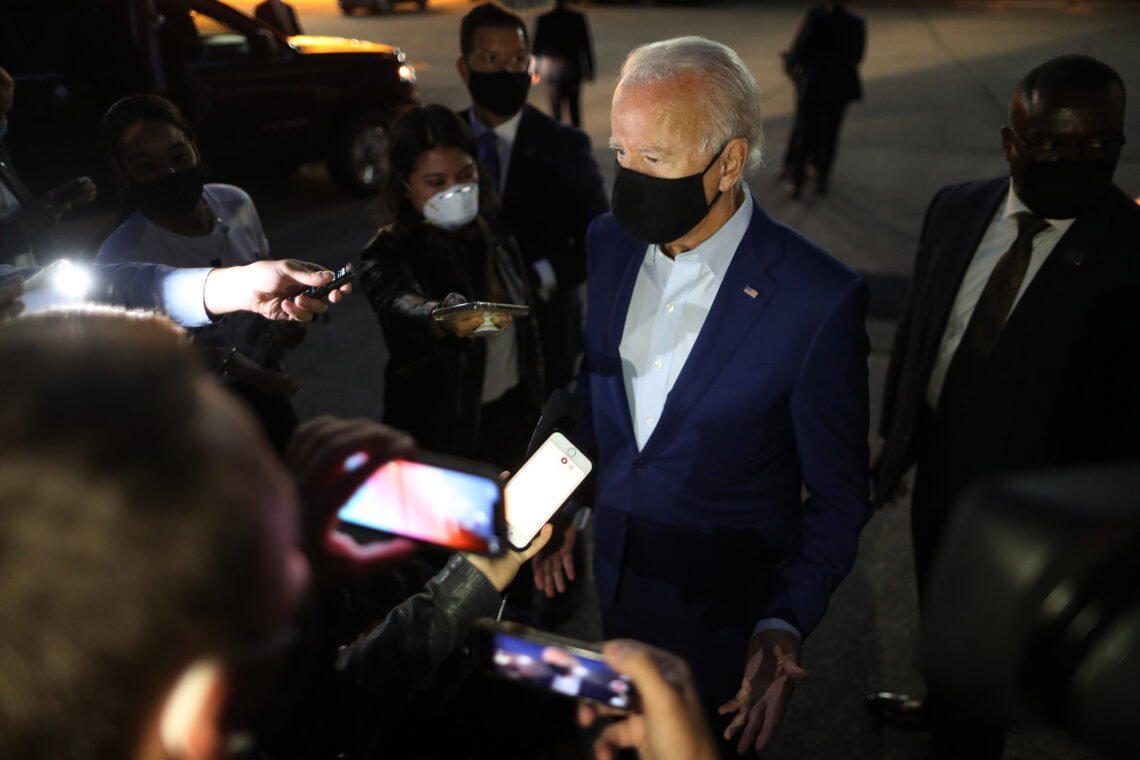 ROMULUS, MICHIGAN - SEPTEMBER 09: Democratic presidential nominee Joe Biden talks with journalists before departing the Detroit Metro area September 09, 2020 in Romulus, Michigan. Biden was campaigning in Michigan, which President Donald Trump won in 2016 by less than 11,000 votes, the narrowest margin of victory in state's presidential election history. (Photo by Chip Somodevilla/Getty Images)