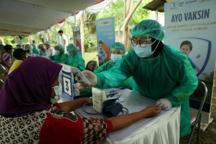 Dorong Ekonomi Sirkular, Danone Indonesia Bersama Pemerintah Kota Tangerang Jemput Bola Vaksinasi Covid-19 Pemulung dan Pelapak