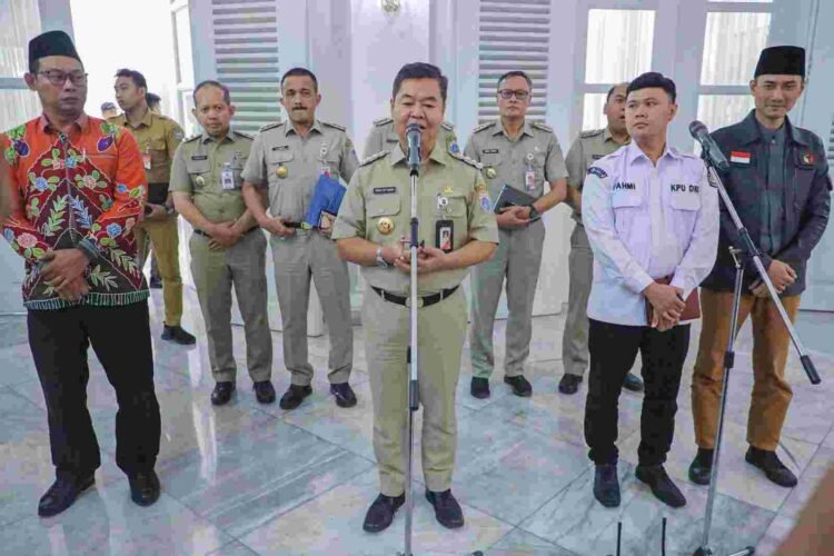 Pj. Gubernur Teguh Gandeng KPU dan Bawaslu Demi Kelancaran Pilkada DKI Jakarta.