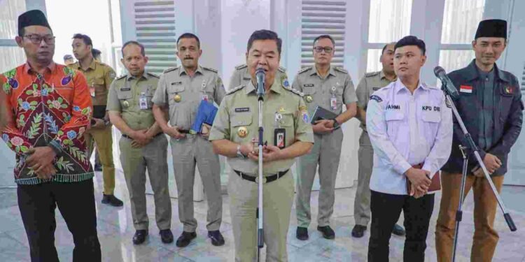 Pj. Gubernur Teguh Gandeng KPU dan Bawaslu Demi Kelancaran Pilkada DKI Jakarta.