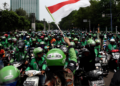 grab resmi terapkan potongan komisi