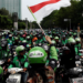 grab resmi terapkan potongan komisi